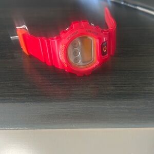 Red g-shock watch. Like new . Needs battery .